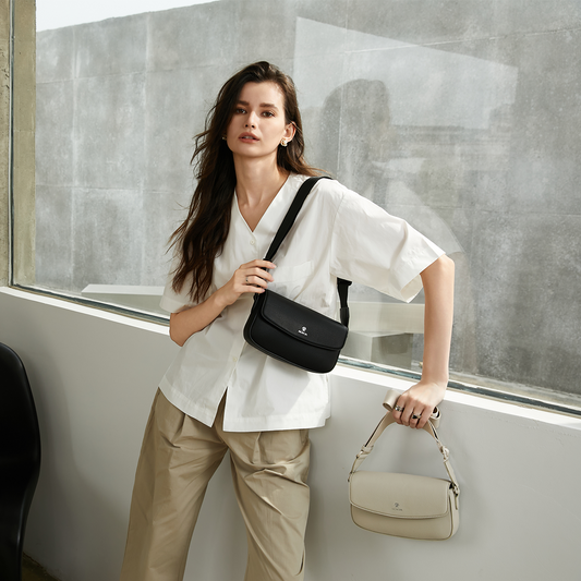 The ACACIA IVY unisex sling bag worn crossbody, showcasing its magnetic flap, hidden zipper, and premium leather-feel texture. A minimalist everyday bag for men and women.