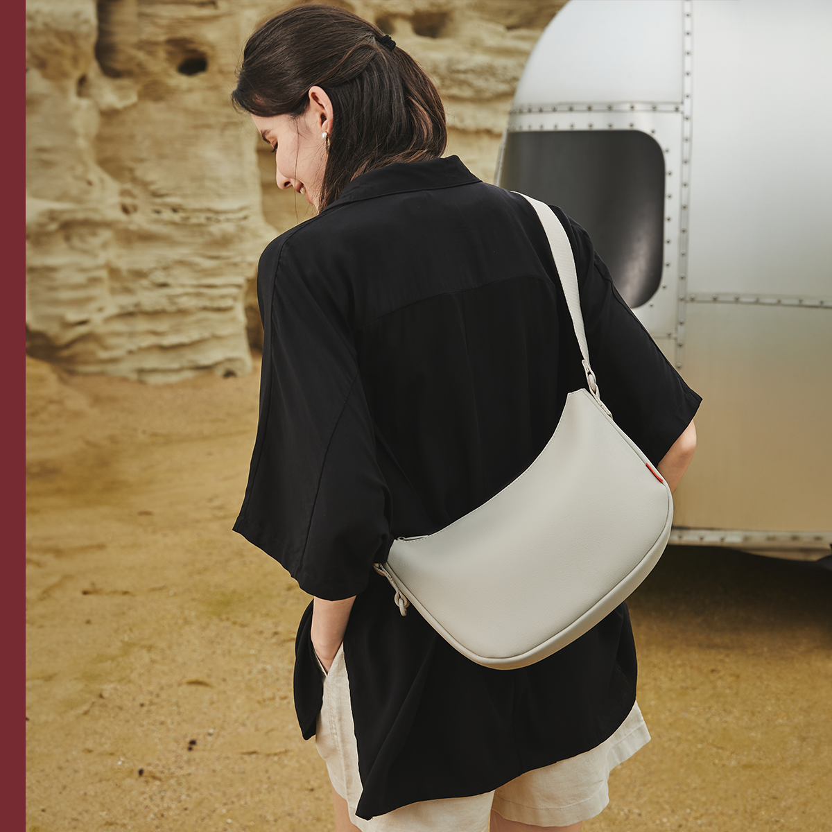 Back view highlighting ACACIA Clover’s premium PU leather, charm loop, and clean minimalist silhouette. A Uniqlo-inspired crossbody fanny pack for travel and everyday style.