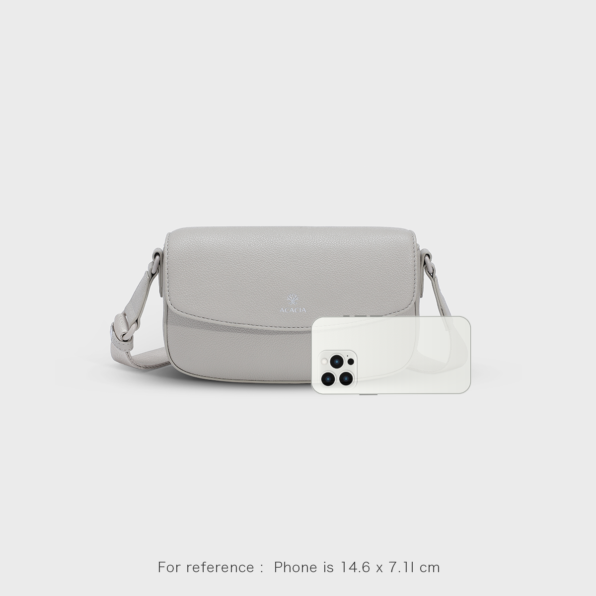 Size comparison of the IVY unisex crossbody bag showing compact fit for phone and essentials. Magnetic flap and hidden zipper provide double protection. A premium vegan leather sling bag for both men and women.