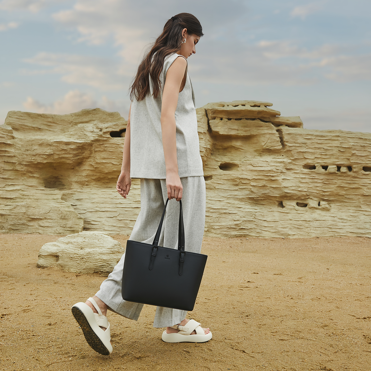 Flat lay of the ACACIA Cedar tote bag with office essentials, showing how the waterproof rigid PU leather tote fits A4 papers, notebooks, tech accessories and daily work items in a minimalist Japanese-designed layout.